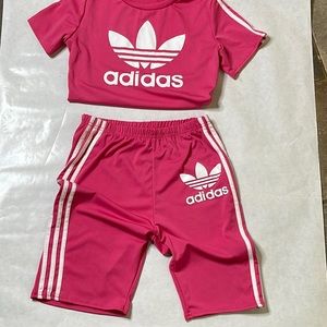 An Adidas biker set two piece .